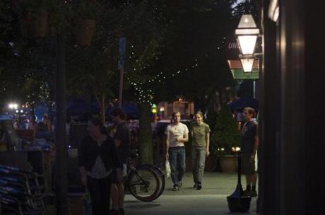 Fred McCullough, 27, and Rachel Insinga, 28, walked through Somerville?s Union Square  on a recent evening.
