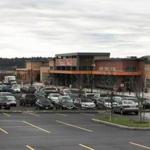 The Market Basket grocery store serves as an anchor for the retail complex.