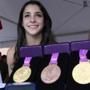 BG.COM SLIDER RAISMAN Olympic gymnast Aly Raisman (cq) returns to Brestyan's American Gymnastics with her medals to sigh autographs for her fans. (Globe staff photo / Bill Greene) section:metro, topic:17raisman