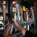 Boston Ma 09/072013 Yard House bartender Jeff Reddington (cq) pours a Boston Beer Company Angry Orchard Hard Cider as a demonstration using the distintive tap. ( Jonathan.Wiggs )Topic:Section:Reporter: Topic: Reporter: