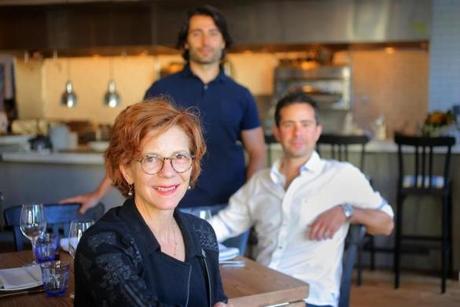 Jody Adams, Eric Papachristos (standing), and Sean Griffing run Porto in a Back Bay residential tower. 
