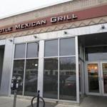 BOSTON, MA - DECEMBER 08: The exterior of Chipotle Mexican Grill seen at 1924 Beacon St. on December 8, 2015 in Boston, Massachusetts. According to Boston College spokesman, 80 students have gotten sick after eating at the fast food chain. (Photo by Scott Eisen/Getty Images)