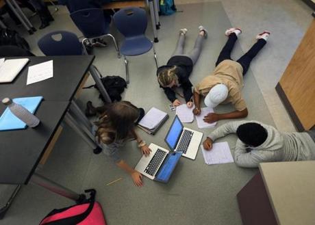 Students worked in a class at Natick High, which is among a growing group of schools turning to international testing.
