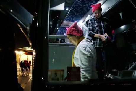 On the Road to Washington, D.C., -- 1/20/2017 - Riders get off of a bus bound for the Women's March on Washington at a rest stop in Delaware. (Jessica Rinaldi/Globe Staff) Topic: 21protestpix Reporter: 
