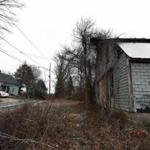 An old building (right) on the site where the Islamic Society of Worcester wants to build a cemetery.