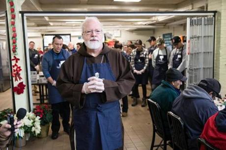 12/24/2017 BOSTON, MA Cardinal Se?n O'Malley (cq) offered a blessing during the Christmas Eve Luncheon held at the Pine Street Inn in Boston. (Aram Boghosian for The Boston Globe)
