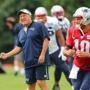 Foxborough-8/05/17- The Patriots held their trainiing camp Saturday at Gillette Stadium practice fields. Coach Bill Belichick smiles as he chats during warmups with qb Jimmy Garoppolo(rt). John Tlumacki/Globe Staff(sports)