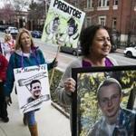 CAMBRIDGE, MA - 04/12/2019 Nancy Tobin, far right, walks ahead of national advocacy groups made up of parents who have lost a child to opioid overdose as they march outside of the Arthur M Sackler Museum at a protest to demand removal of the Sackler name from any public space. Tobin lost her 22-year-old son, Scott, to an overdose in 2017. (Erin Clark for The Boston Globe)