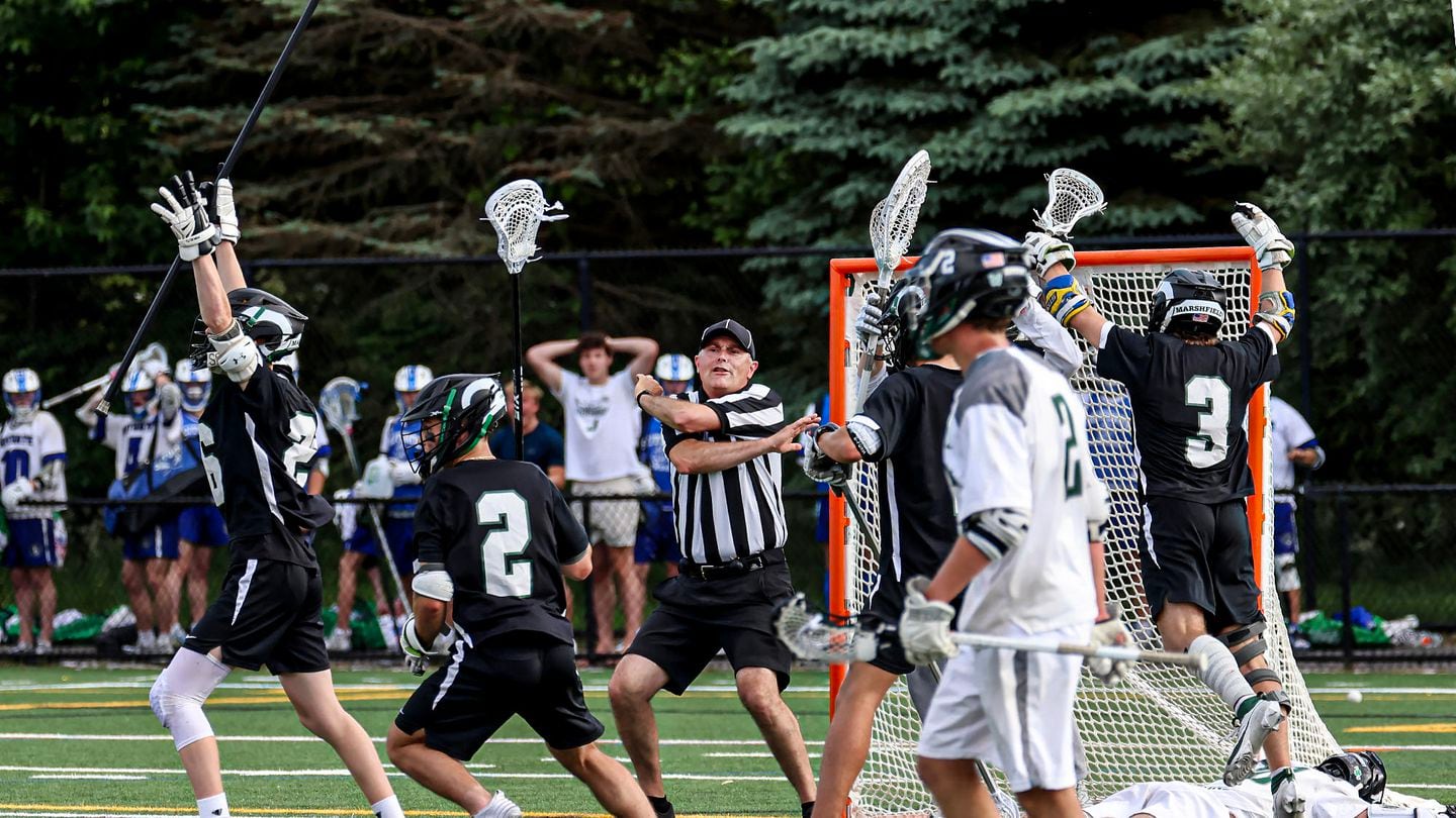 Duxbury's last-gasp attempt to tie the game was ruled no good by the game official, igniting a wild celebration by fourth-seeded Marshfield after its 10-9 victory over the top-seeded Dragons in the Division 2 semifinal.