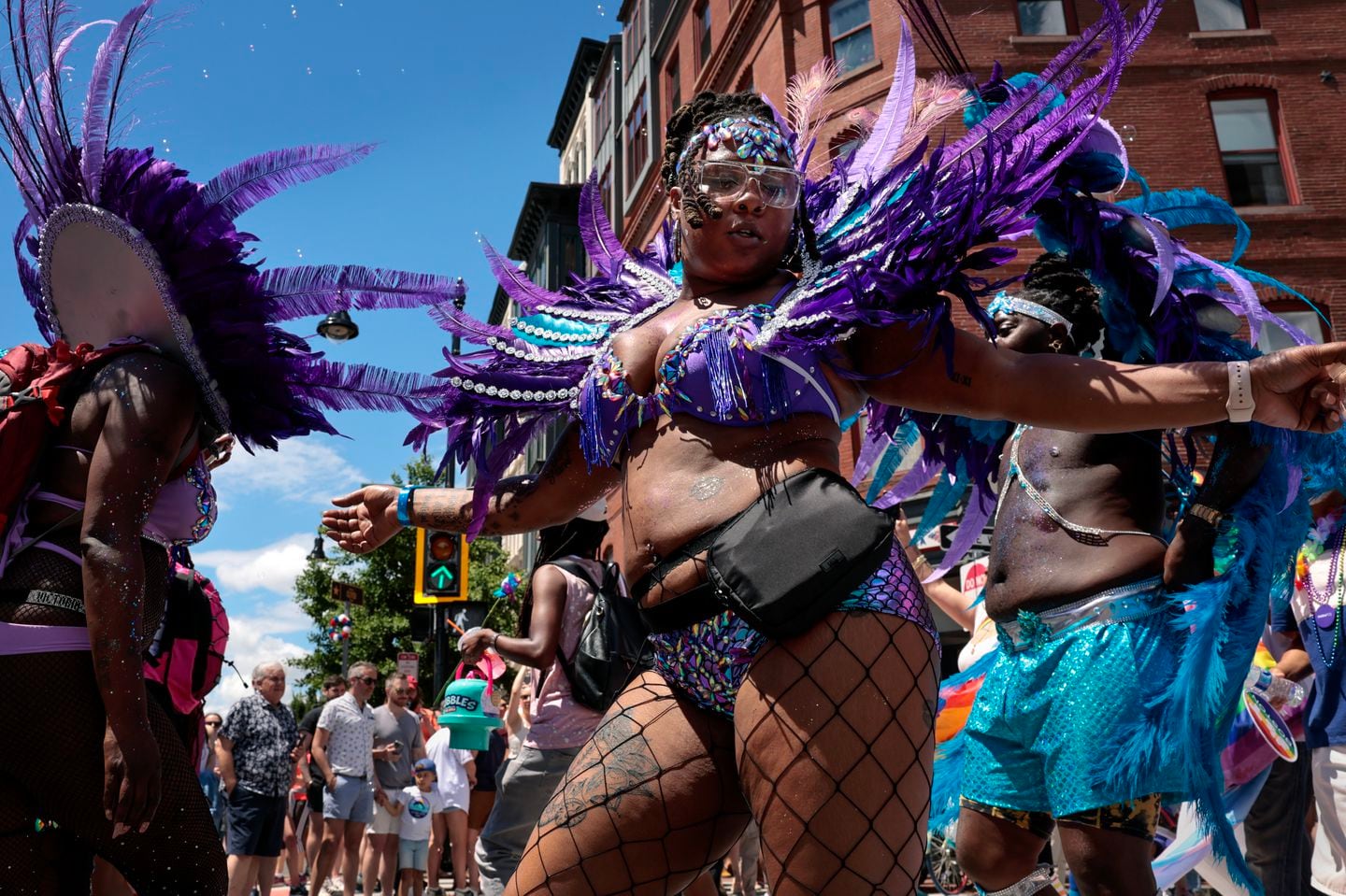 Members of Island Pride Boston dance during the Boston Pride for the People parade.