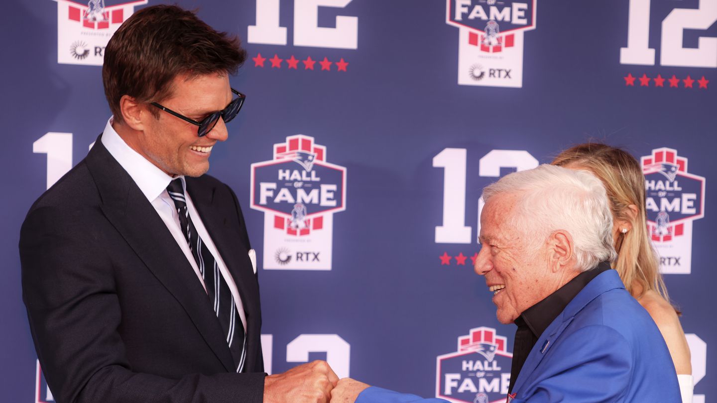 Tom Brady fist bumps Robert Kraft during the red carpet for Tom Brady's Hall of Fame Induction Ceremony.