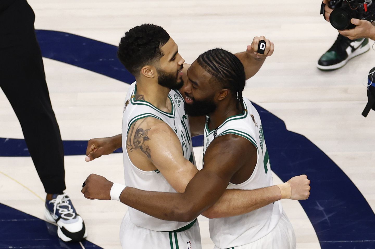 When the Mavericks erased a 21-point deficit and pulled within 3 points, the Celtics embraced the combined efforts of Jayson Tatum (left) and Jaylen Brown (right) to help pull them through to a Game 3 win in Dallas.