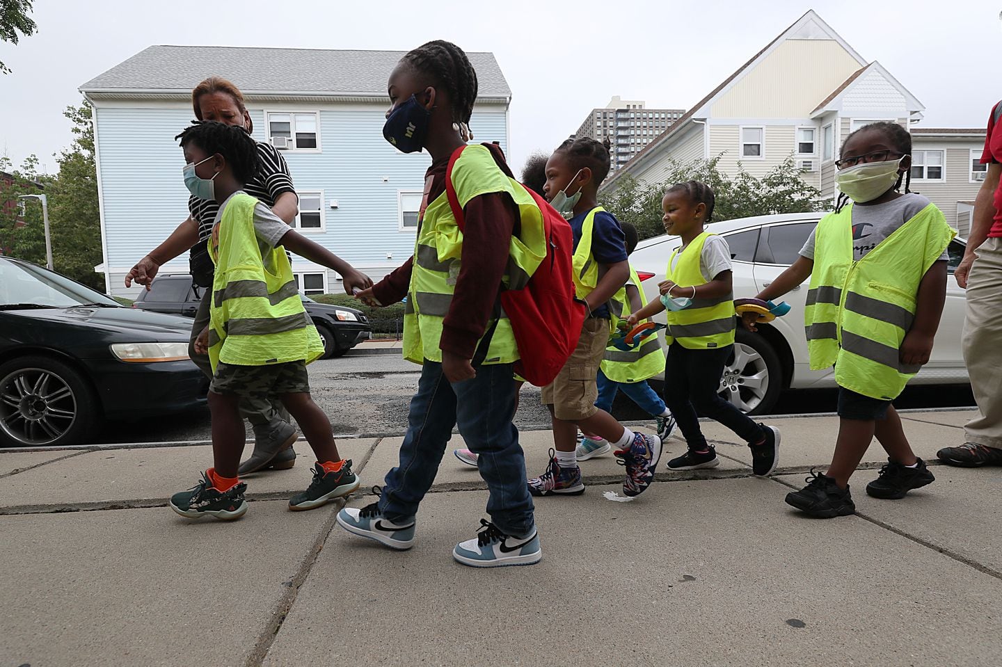 Children from a Nurtury site took a neighborhood walk in 2021.