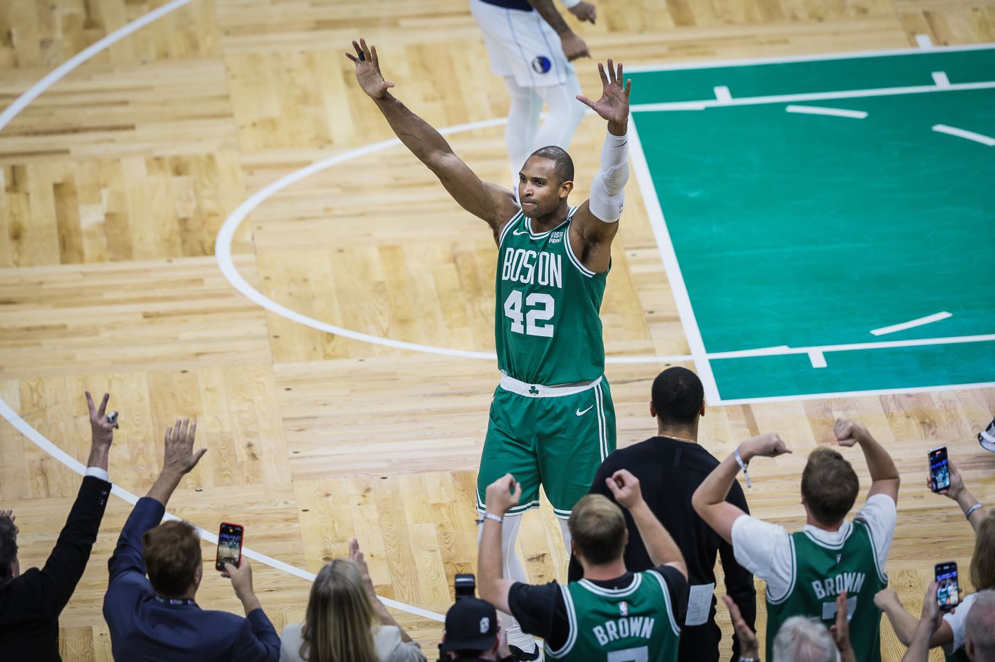 Al Horford raised his arms to the crowd during the final minutes leading up the win.