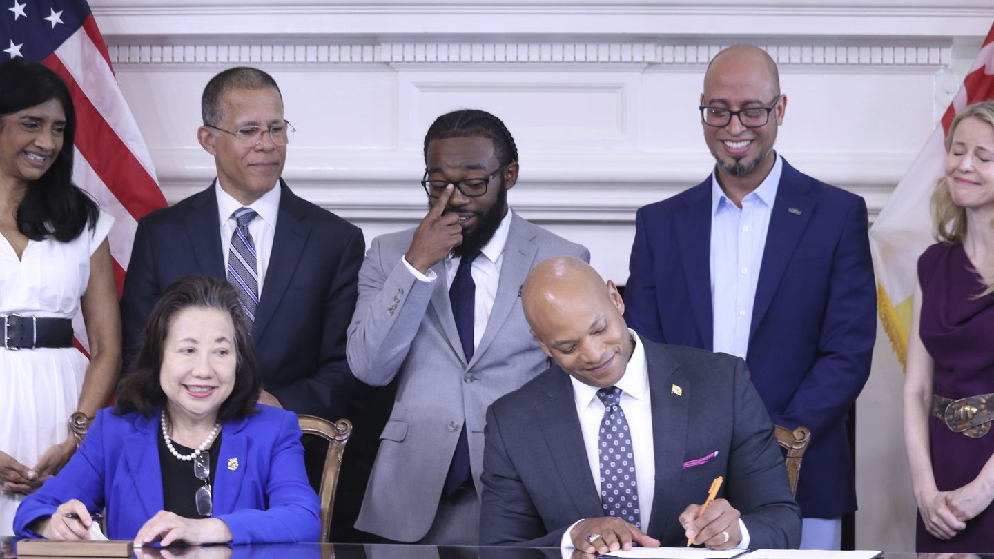 Maryland Governor Wes Moore signs an executive order to issue more than 175,000 pardons for marijuana convictions on June 17, in Annapolis, Md.