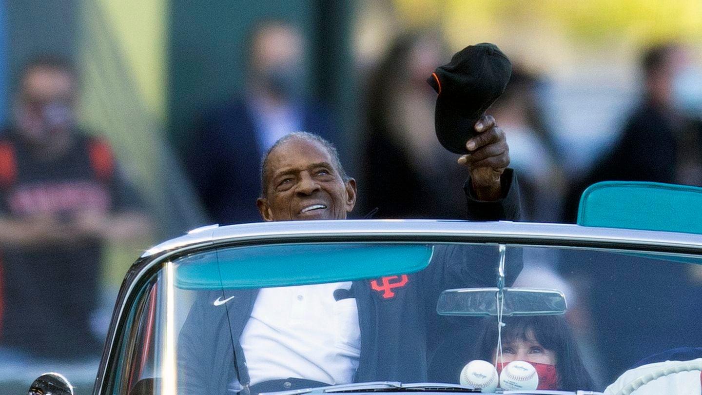 Baseball Hall of Fame outfielder Willie Mays waves to the crowd as the San Francisco Giants honored him on his 90th birthday, May 7, 2021.