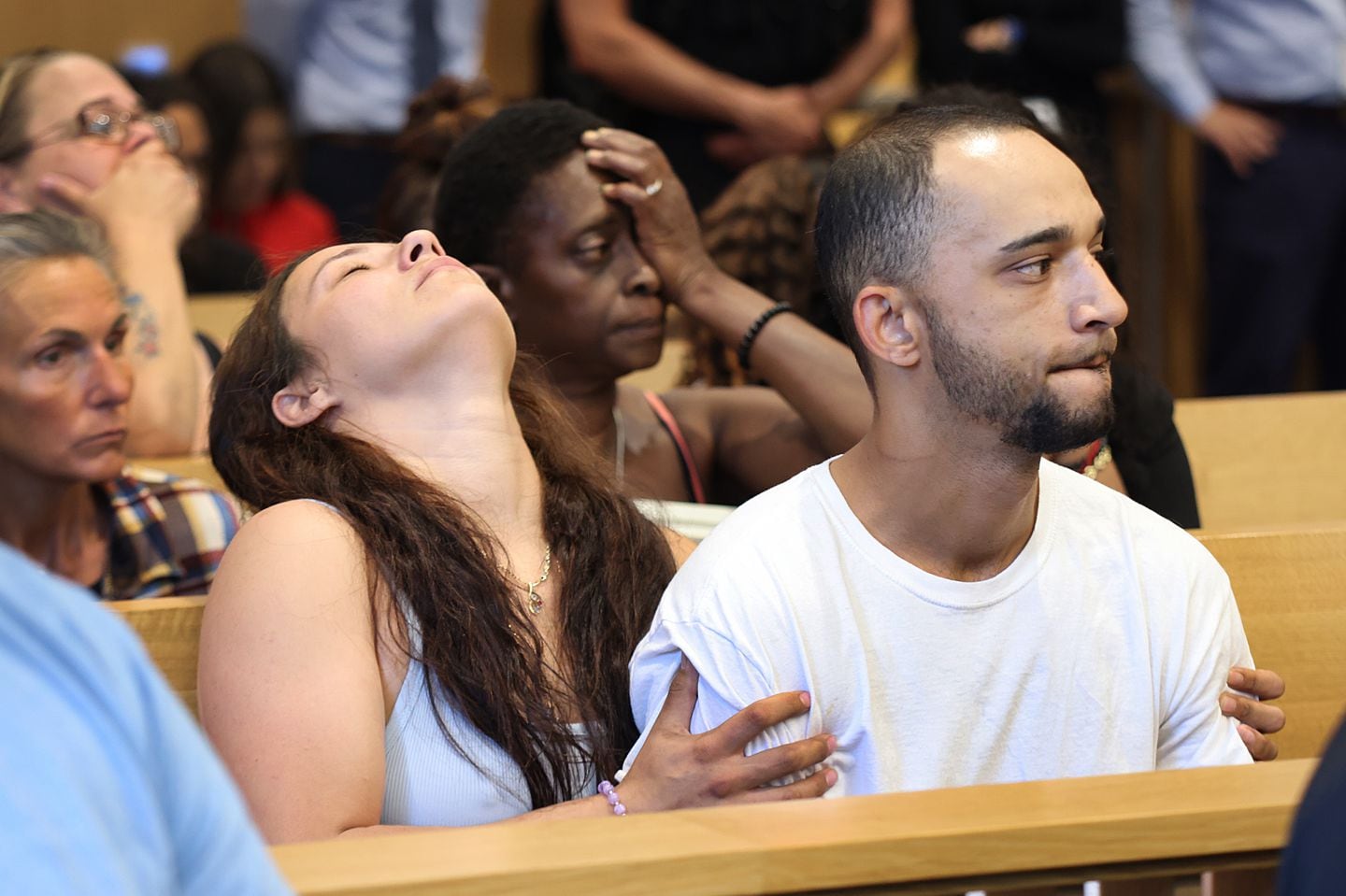 Scott Dickey (right) reacted while Trevor Bady, 21, was arraigned Tuesday in the killing of Dickey's daughter, Ahliana M. Dickey. The 15-year-old girl was found dead of gunshot wounds Friday in her home in Lowell.