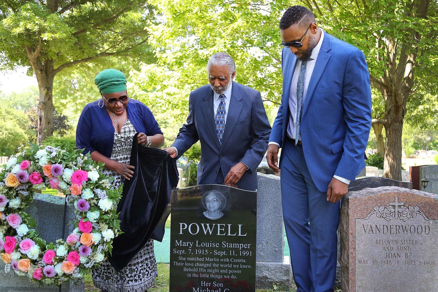 A grave stone unveiling and dove release in honor of Mary Louise Powell, a Boston educator and the matchmaker of Martin Luther King Jr. and Coretta Scott, was held at St. Joseph’s Cemetery on Tuesday.