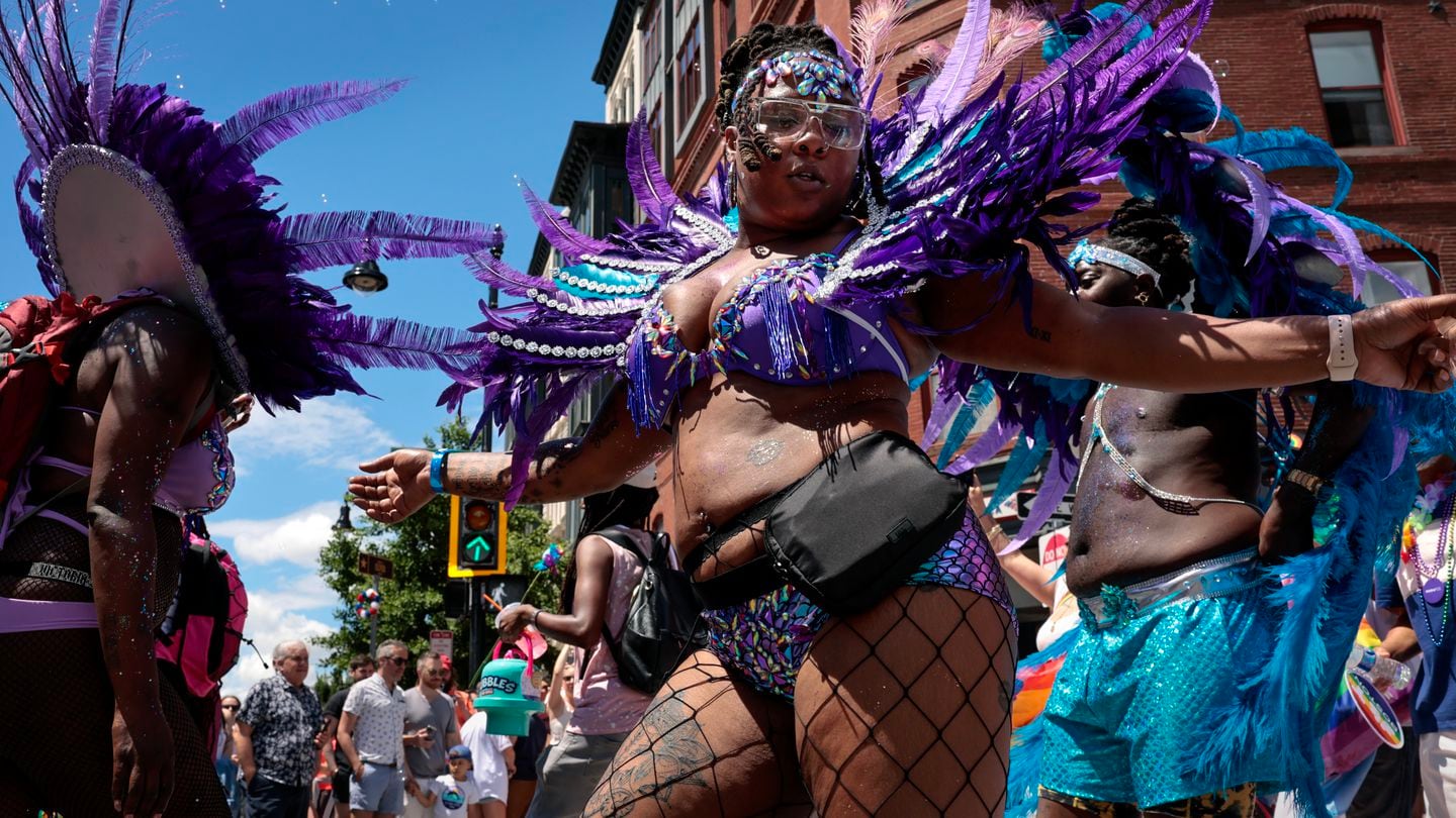 Members of Island Pride Boston dance during the Boston Pride for the People parade.