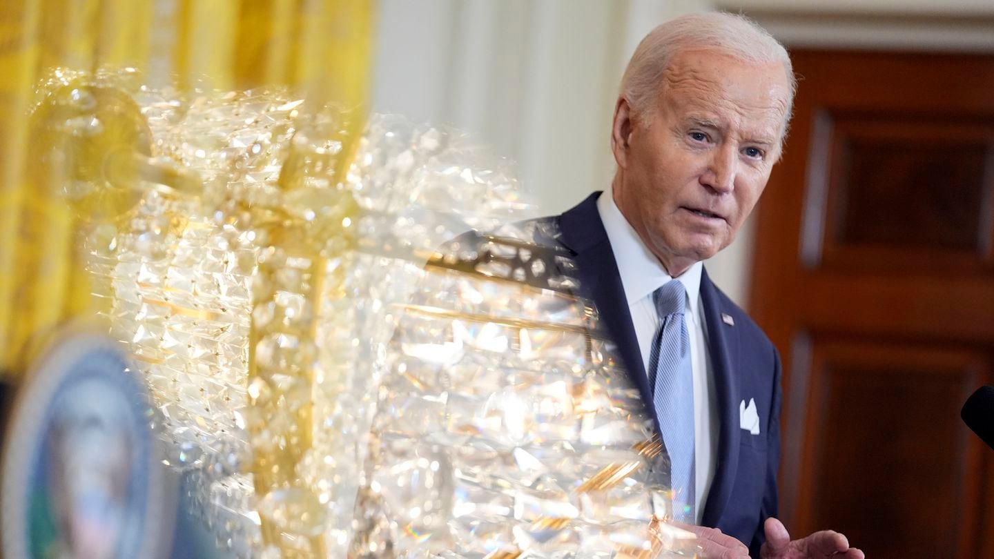 As a teleprompter screen reflected a chandelier, President Biden spoke during a news conference with President William Ruto of Kenya in the the White House on May 23.