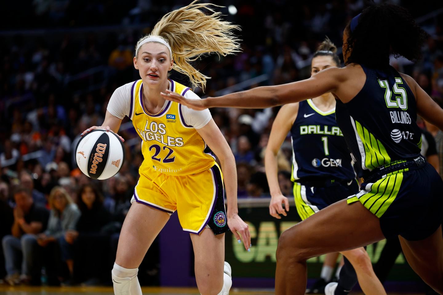 Cameron Brink controls the ball against Monique Billings of the Dallas Wings.