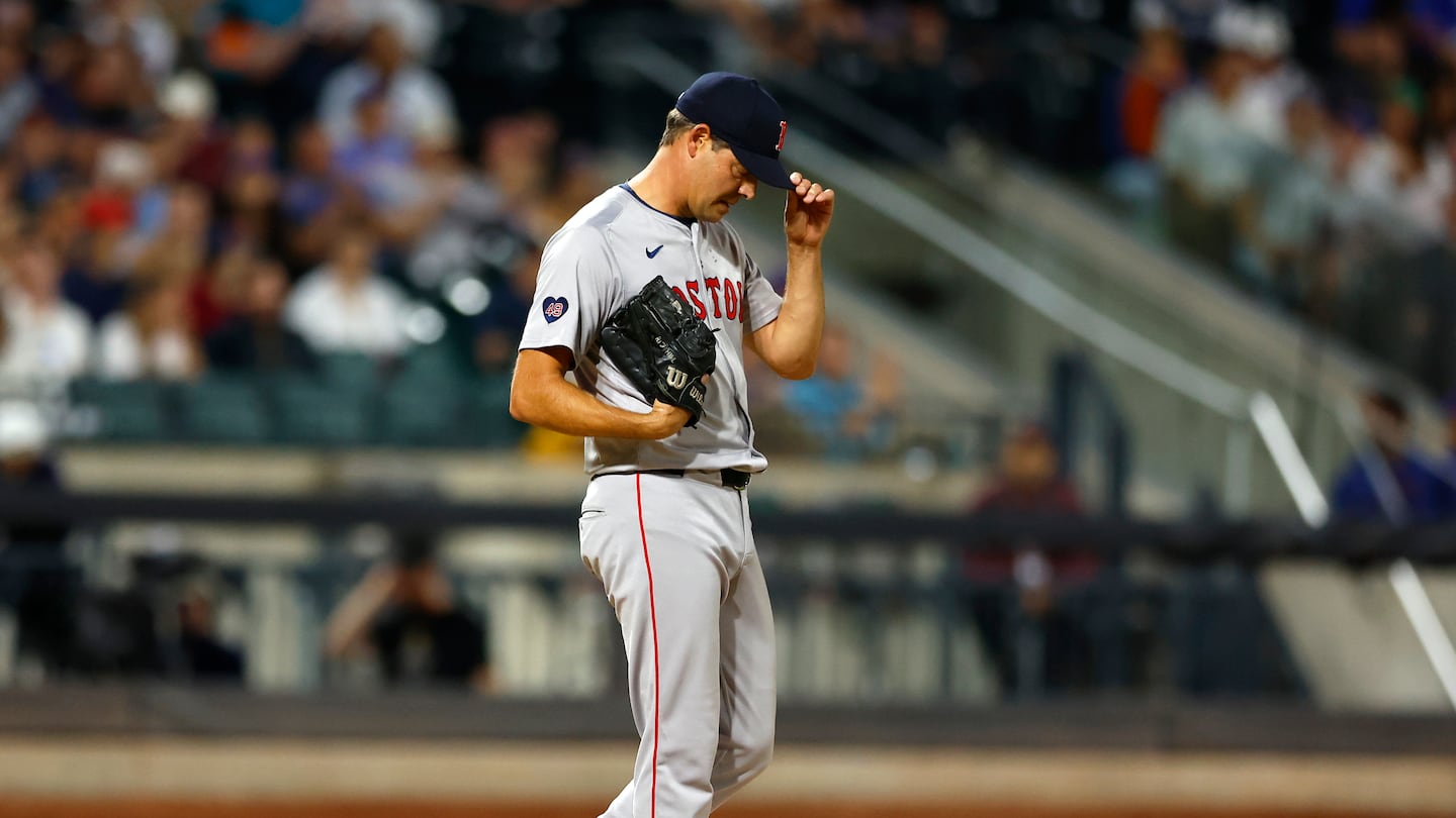 Red Sox reliever Rich Hill (above) reacts after walking in a run during the eighth inning of an 8-3 loss to the Mets Wednesday night at Citi Field.