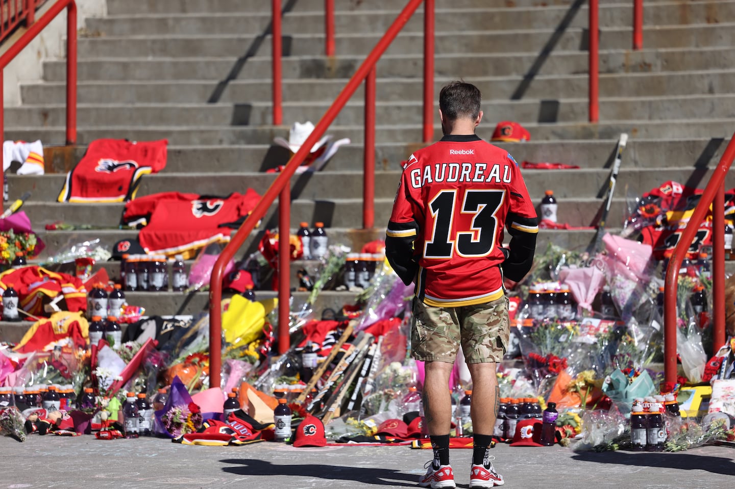 Hockey fans paid their respects to former Calgary Flames star Johnny Gaudreau and his brother Matthew at a memorial on the steps at the Scotiabank Saddledome on Aug. 31 in Calgary, Alberta, Canada.