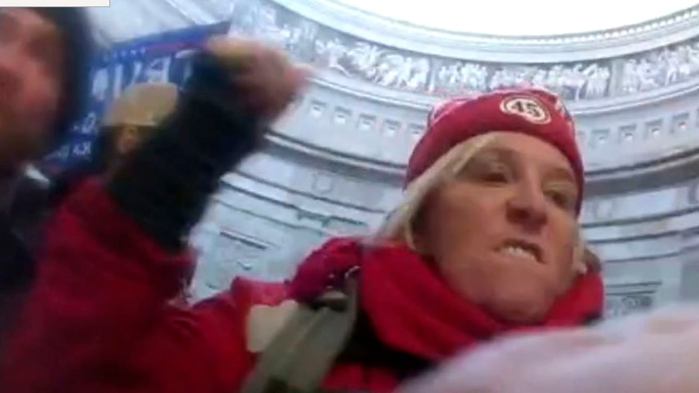 This image from US Capitol Police body-worn video that was in the government sentencing memorandum in the case, shows Dr. Jacquelyn Starer, 71, of Ashland, striking a police officer in the Rotunda of the US Capitol on Jan. 6, 2021, in Washington.