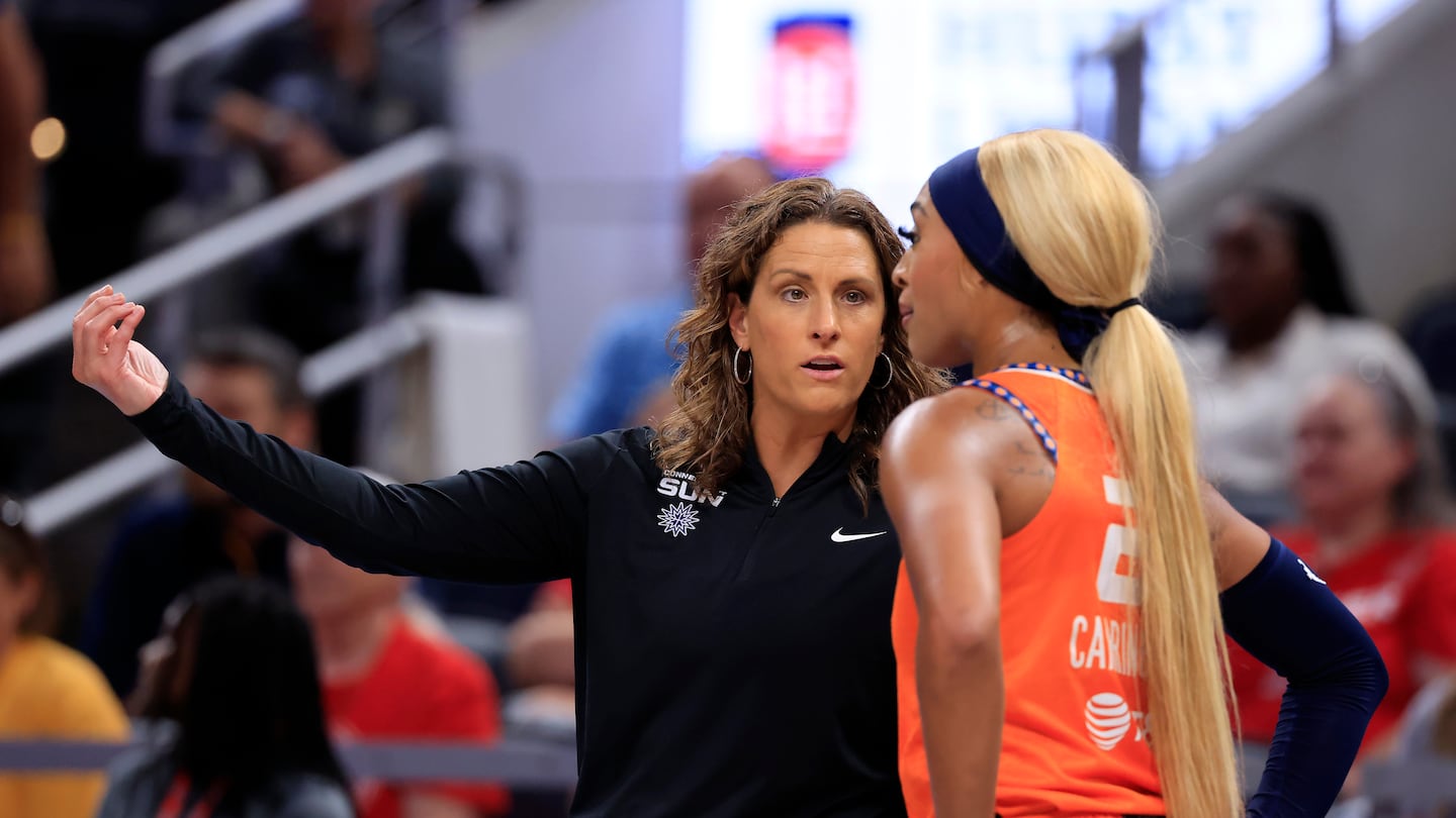 Connecticut Sun coach Stephanie White and guard DiJonai Carrington couldn't stop the Las Vegas Aces from rallying for a win Friday night in Uncasville, Conn.