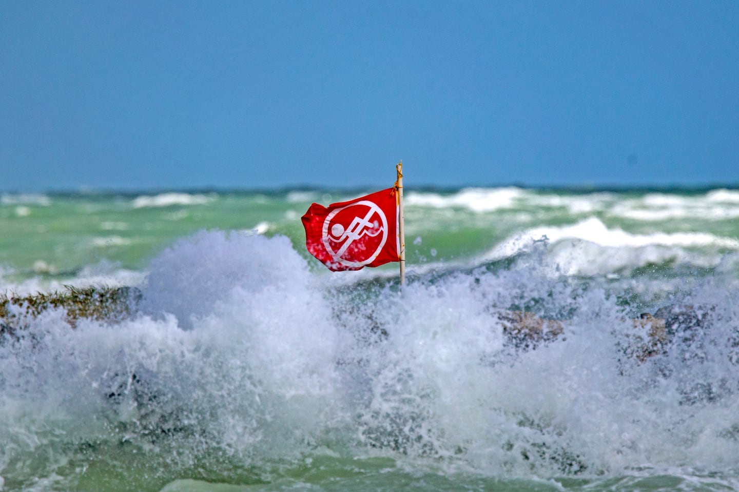 A high surf advisory and rip current alert have been issued for coastal New England and the islands through Saturday.