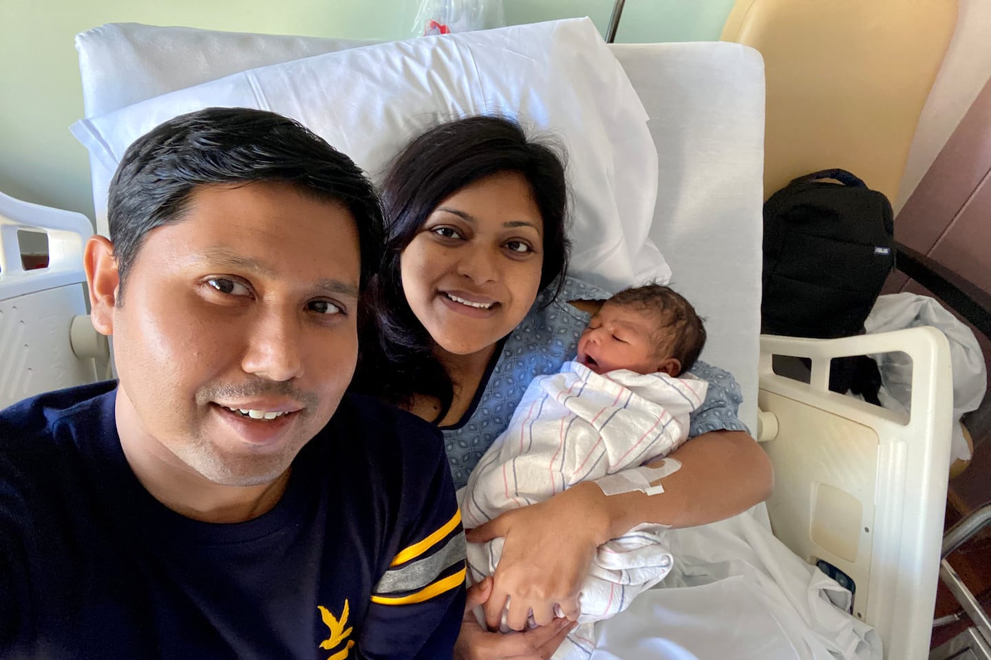 Nabil and Sungida with their newborn daughter, Otindria, the morning of her birth. Sungida died shortly after giving birth.