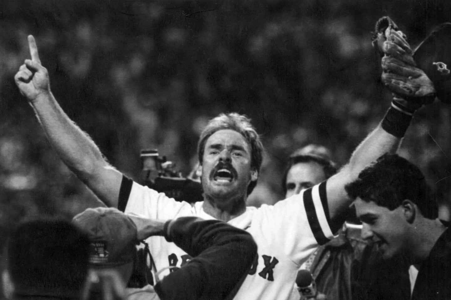 Wade Boggs celebrates after the Red Sox clinched the AL East in 1990 with a win over the White Sox.