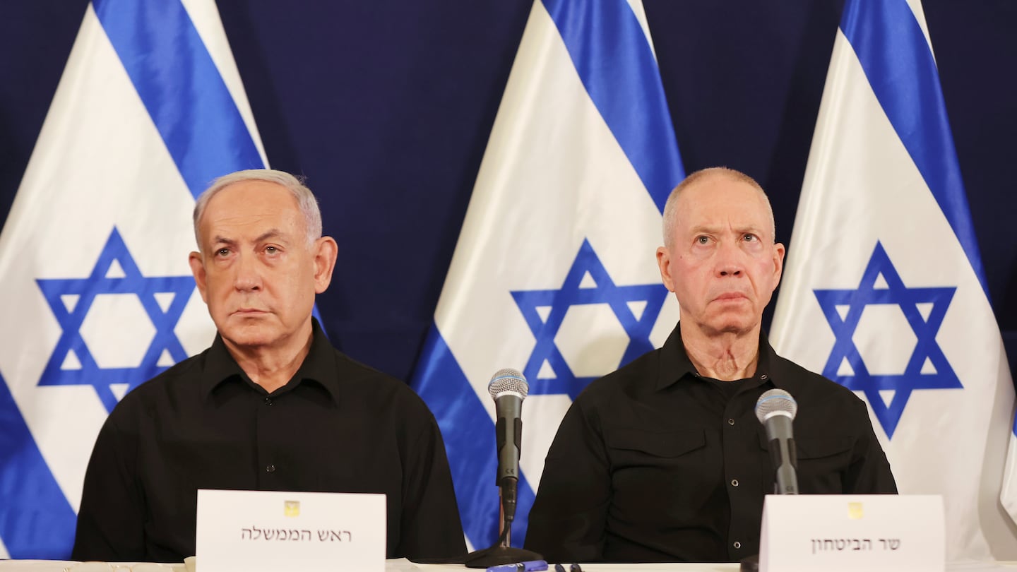 Israeli Prime Minister Benjamin Netanyahu, left and Defense Minister Yoav Gallant attend a press conference in the Kirya military base in Tel Aviv, Israel, Oct. 28, 2023.