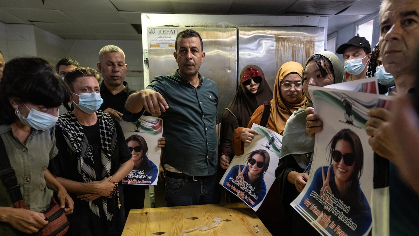 Palestinians and international activists gathered inside the morgue where Aysenur Eygi's body was being kept on Sunday.