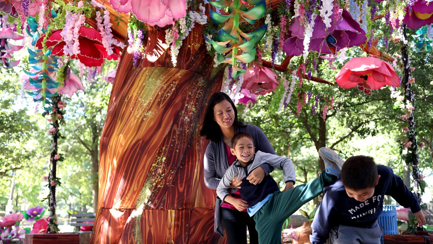 Mayor Michelle Wu helped her son Cass down from his brother, Blaise’s shoulders at the Franklin Park Zoo on September 8, 2024. The family was there to promote the BPS Sundays program.