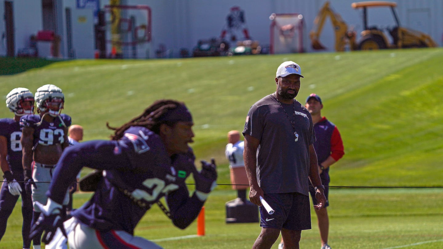 Seen in the background, the hill is a roughly 50-yard stretch that includes a steady incline and runs between the upper and lower practice fields behind Gillette Stadium.