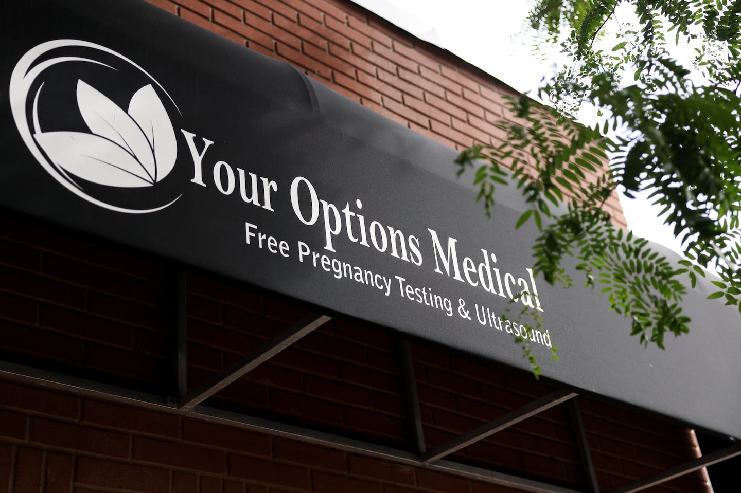 The awning outside of Your Options Medical in Revere in 2022. Crisis pregnancy centers are trying to beat back the criticism they’re facing from Governor Maura Healey and other state officials.