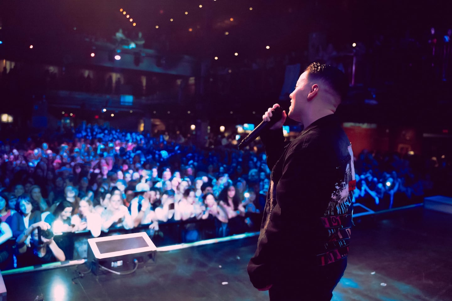 LGBTQ Nightlife Events cofounder Thais Rocha took the stage during a Sapphic Nights event at the House of Blues on Jan. 28, 2023, to announce her plan to open Dani's Queer Bar, Boston's only dedicated sapphic nightlife space.