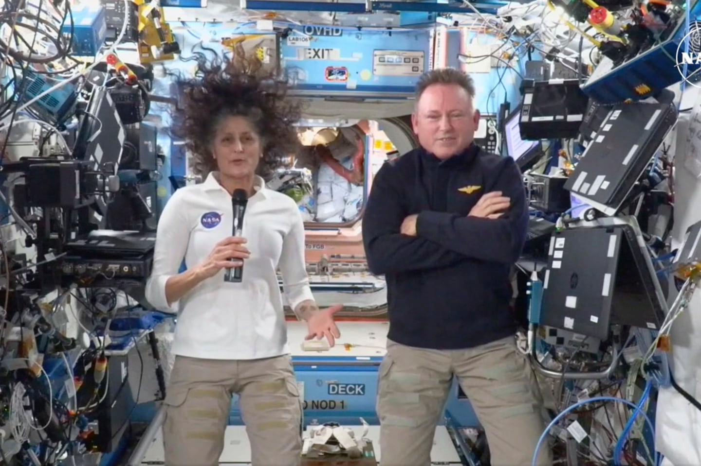 NASA astronauts Suni Williams and Butch Wilmore during a press conference from the International Space Station on Friday.