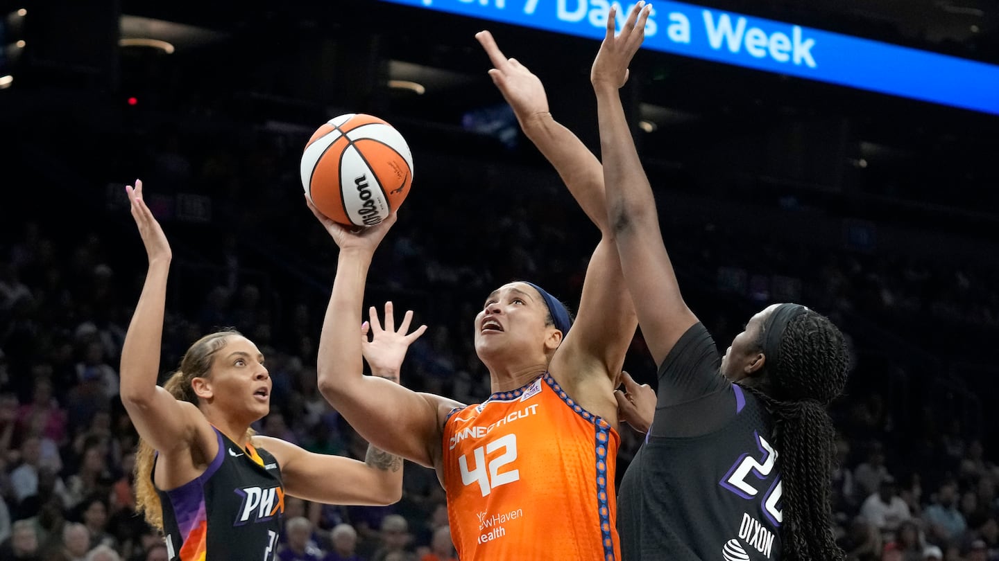 Sun forward Brionna Jones (42), shown playing against Phoenix back on July 1, scored 20 points on 10 of 16 shooting to lead Connecticut to the road win over the Mercury Friday night.