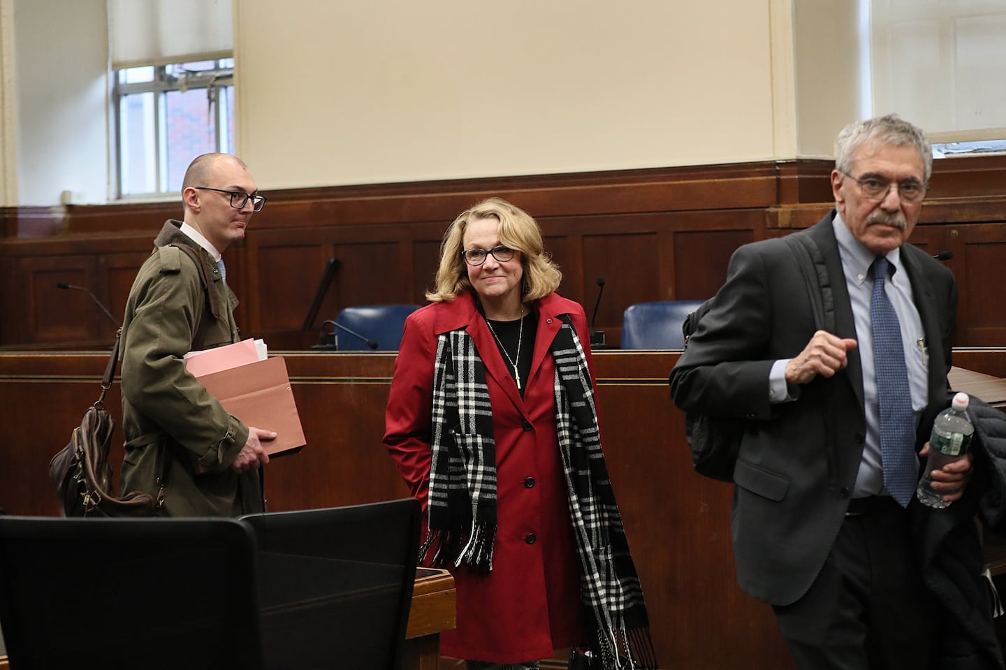 Shannon O'Brien, center, was in Suffolk Superior Court with her attorneys, William Gildea, left, and Max D. Stern on Dec. 4, 2023. On Monday, Treasurer Deb Goldberg fired O’Brien after a process that dragged out for a year.