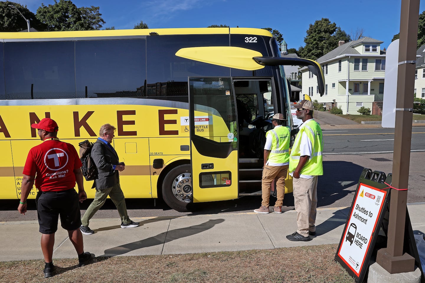 Commuters boarded buses outside the Quincy Center Station last week.