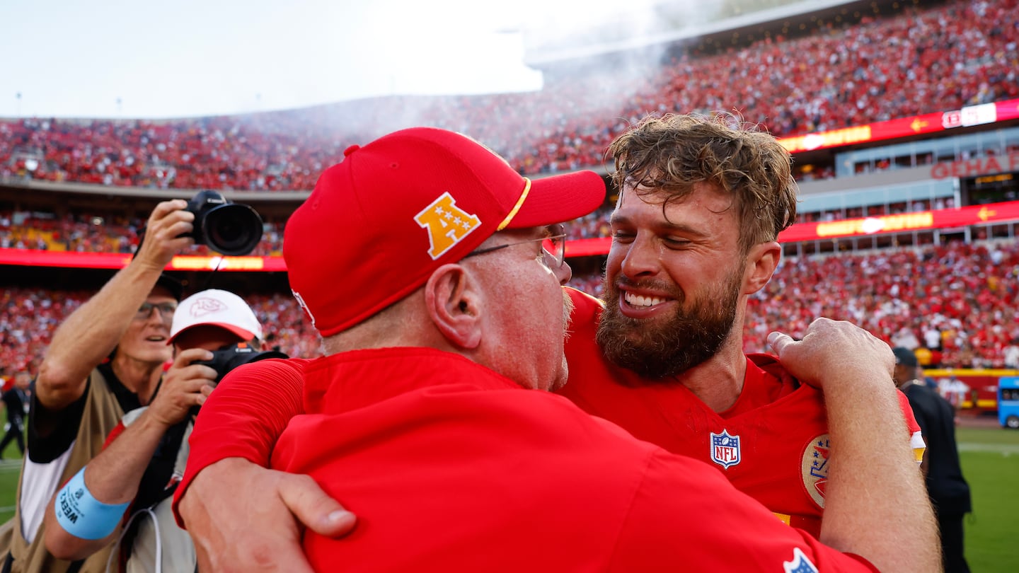 Chiefs coach Andy Reid and kicker Harrison Butker share an embrace after the latter's last-second field goal pushed Kansas City to 2-0, and the Bengals to 0-2.