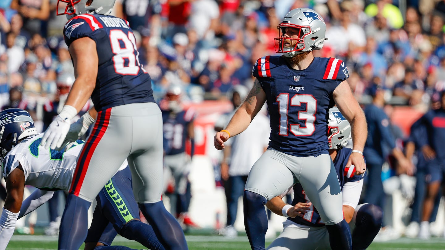 A fourth-quarter field goal attempt by Joey Slye (right) was blocked, and it led to a loss that the Patriots could have turned into a win.