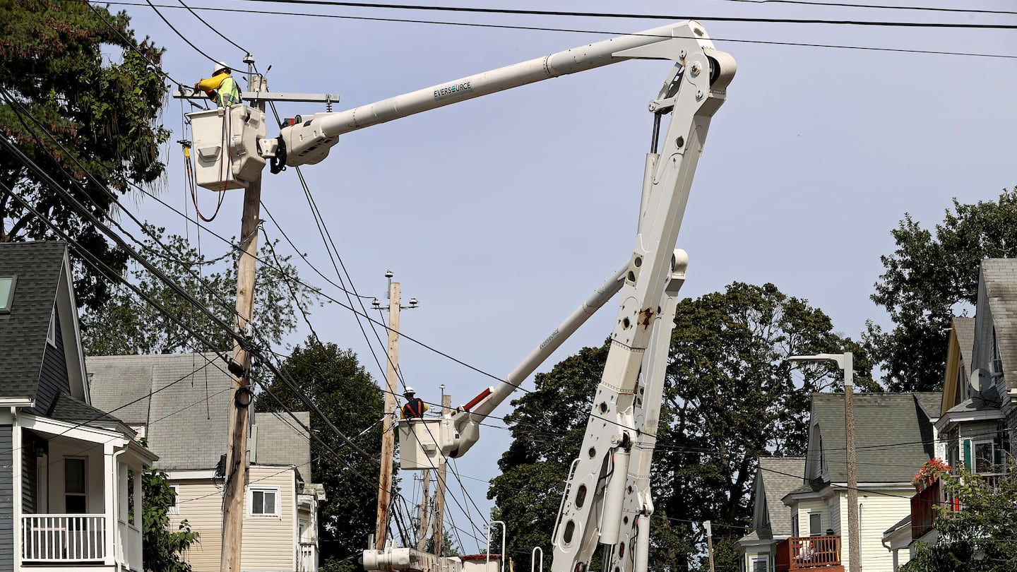 Eversource crews work on power lines in Dorchester in 2023.