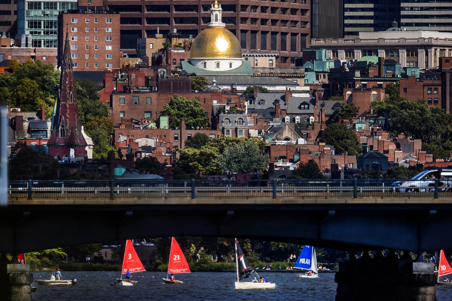 Bike paths, pedestrian walkways, and cars have spectacular views from Mass. Ave. as it crosses the Charles River, with Beacon Hill and the State House in the background.