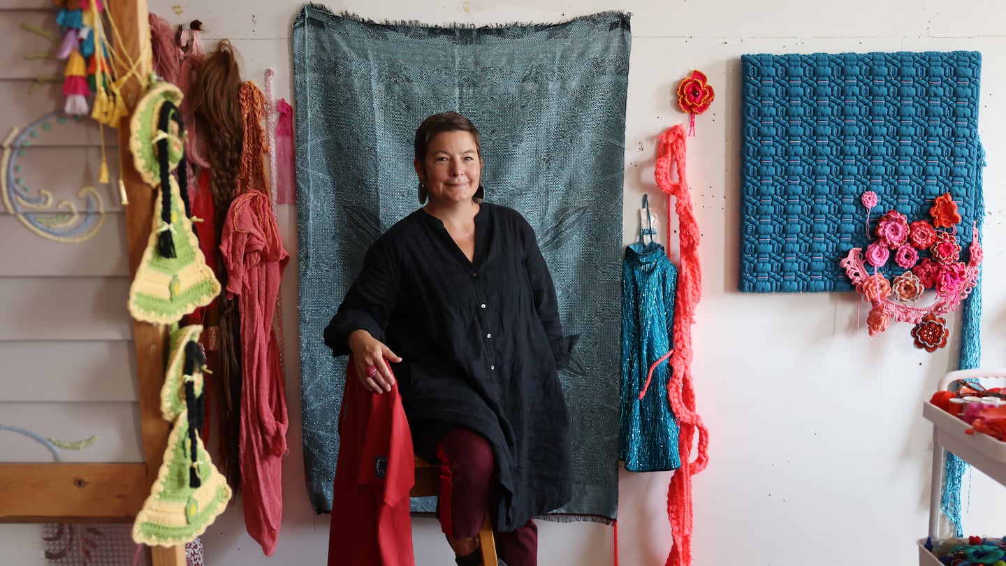 Hyde Park, MA  — 09/11/2024 - Sam Fields posed for a portrait inside her studio. Her exhibition at LaMontagne Gallery, "eating beauty." is up through Oct. 11. (Jessica Rinaldi/Globe Staff)