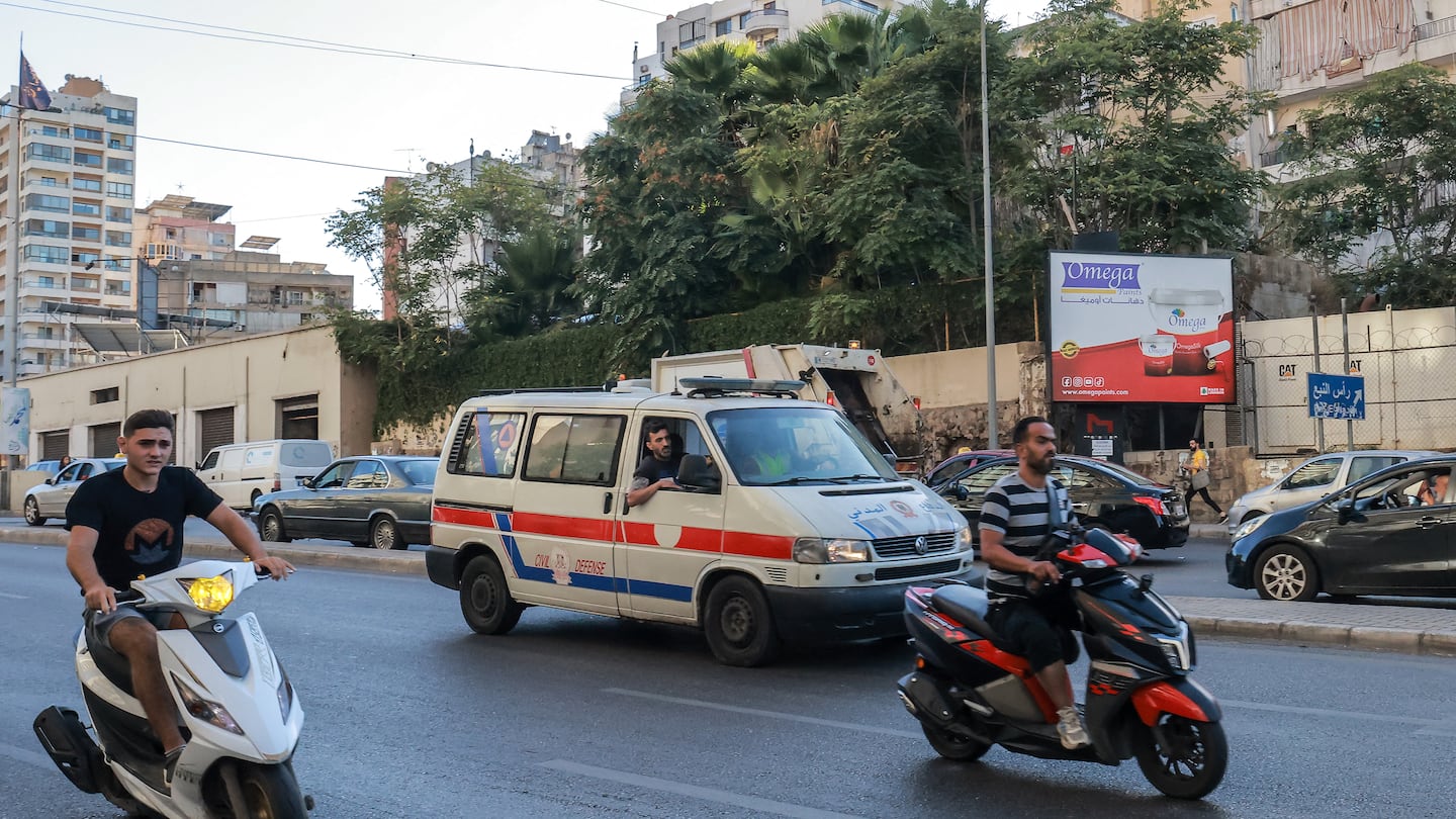 A Lebanese Red Cross ambulance rushed wounded people to a hospital in Beirut Tuesday.