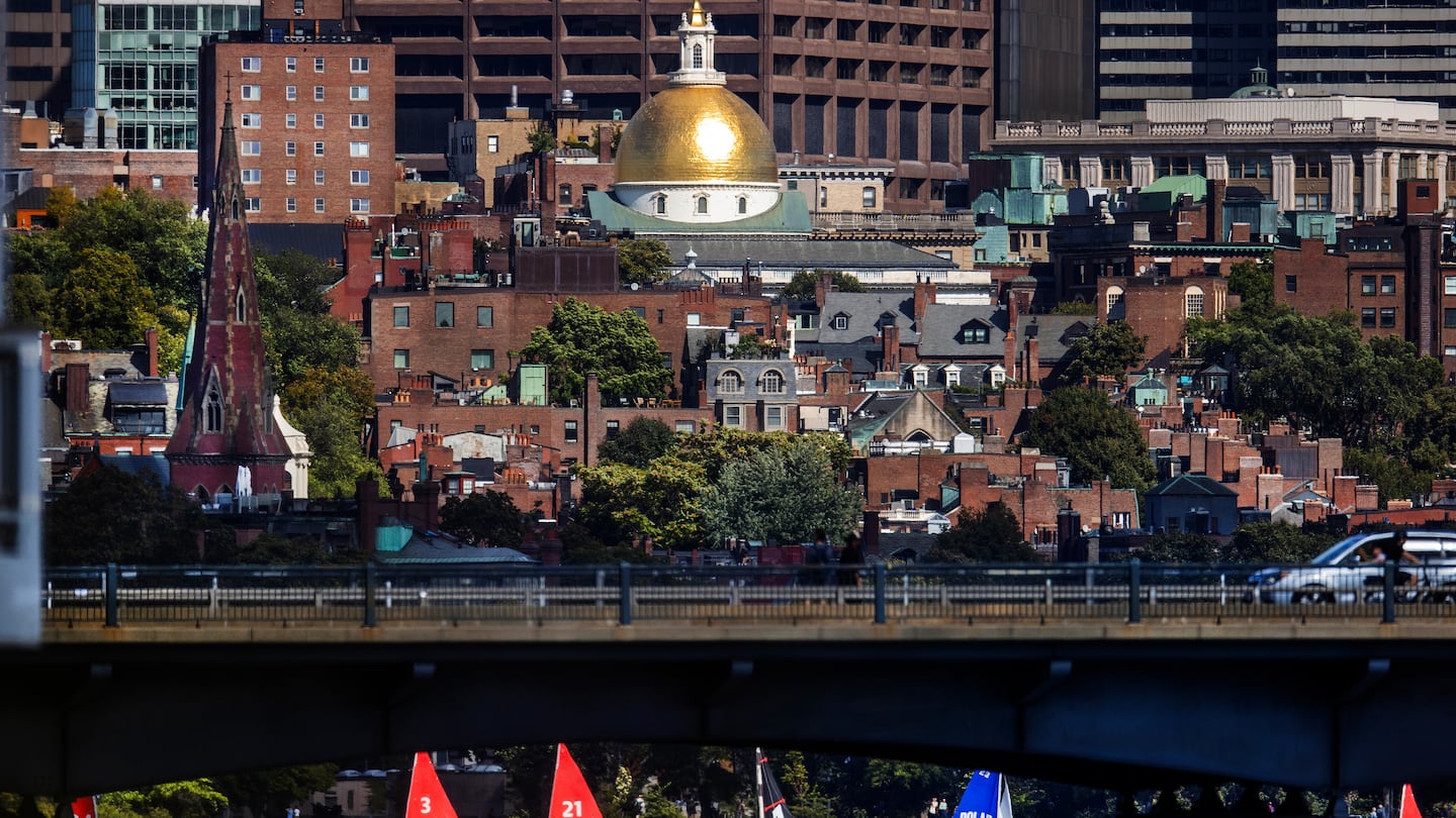 Bike paths, pedestrian walkways, and cars have spectacular views from Mass. Ave. as it crosses the Charles River, with Beacon Hill and the State House in the background.