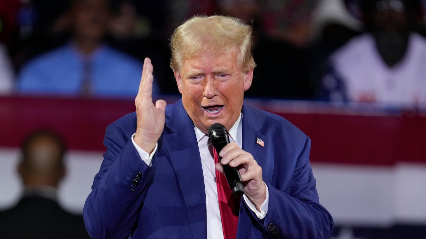 Former president Donald Trump speaks during a town hall event at the Dort Financial Center in Flint, Mich., on Sept. 17.